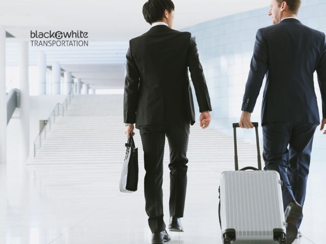 Business Professionals Heading to a Corporate Holiday Event with a Toledo Limousine Service