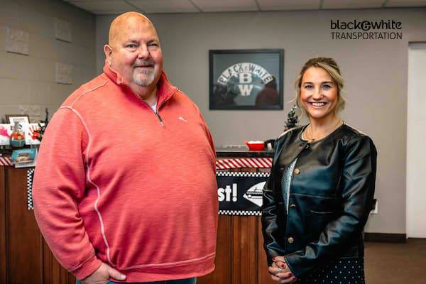 Clark Gross, CEO of Black & White Transportation, and Jenn Schacht, Director, Community Engagement, for Black & White Transportation