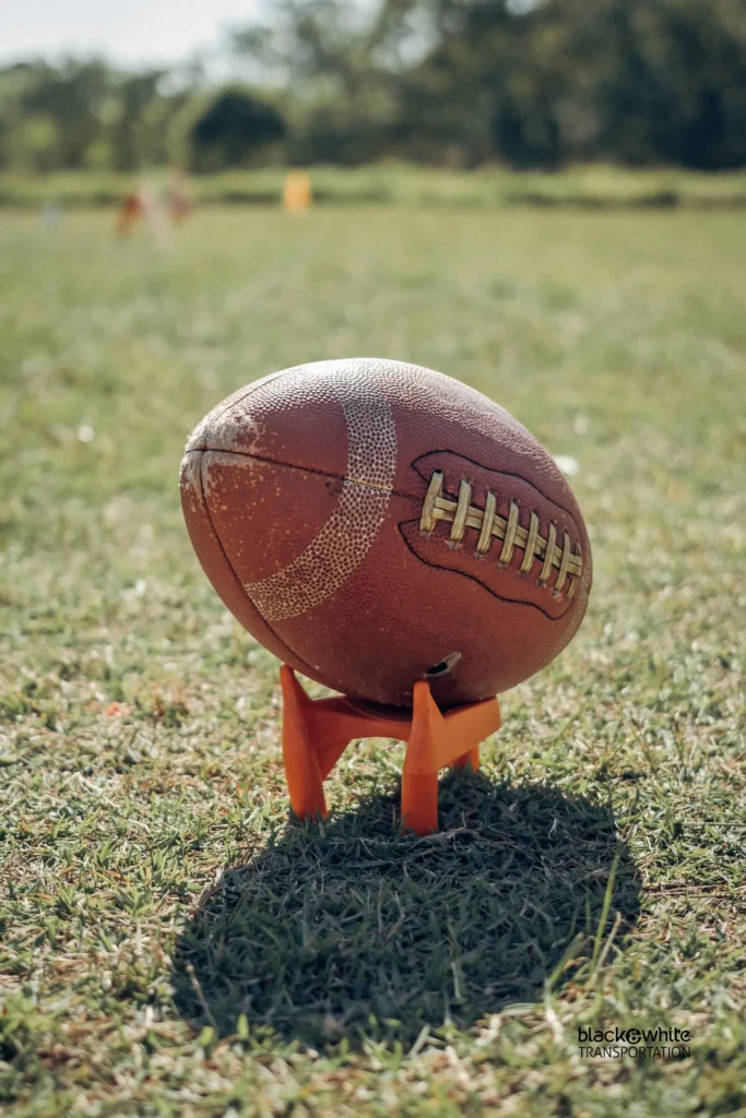 Football on a Tee on a Grass Field